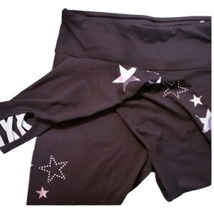 Justice black with stars and turquoise lattice